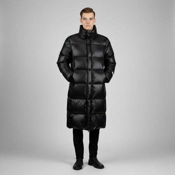 ❄️ Maximum warmth. Minimal effort.
This long black parka is your ultimate shield against the cold...